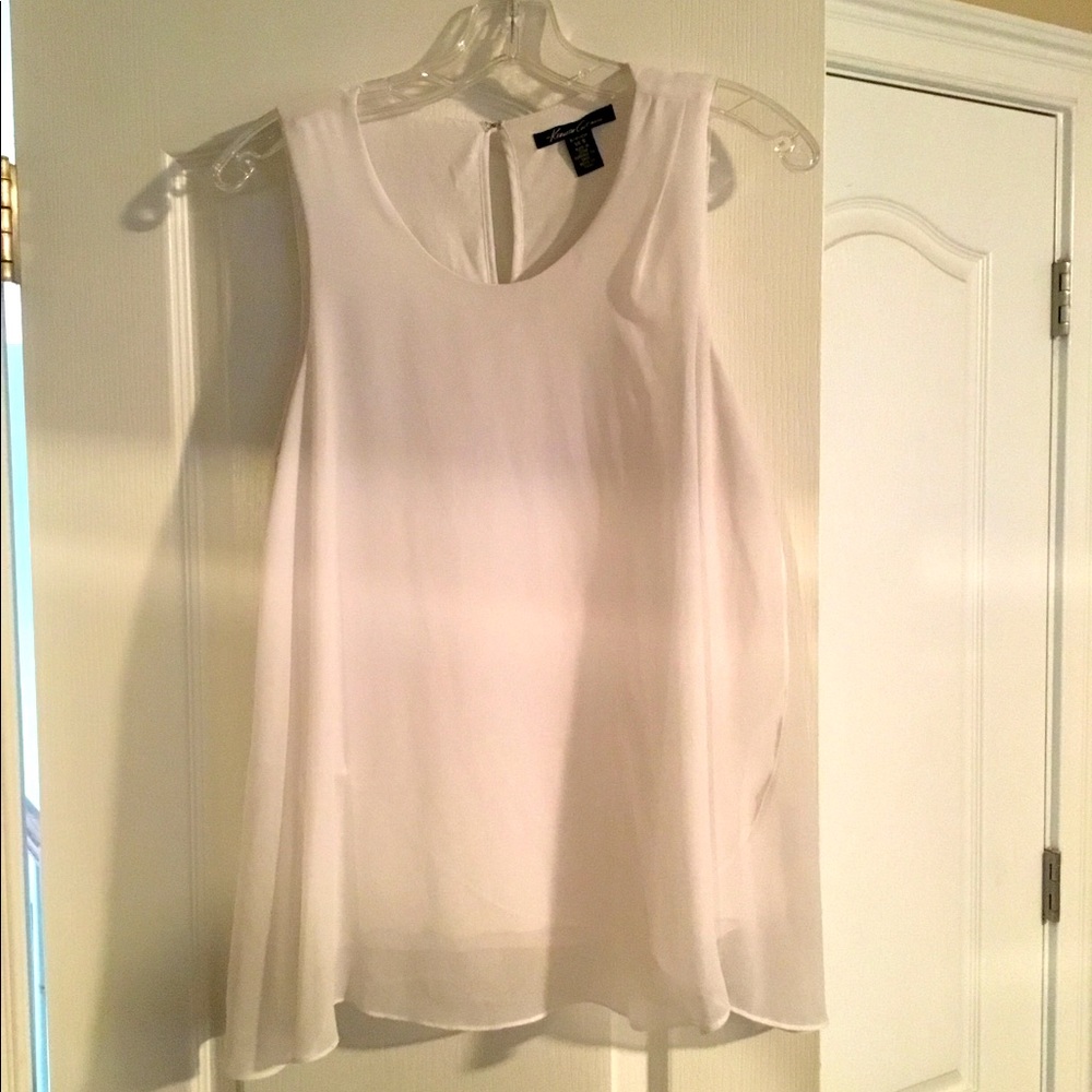 White sheer sleeveless blouse